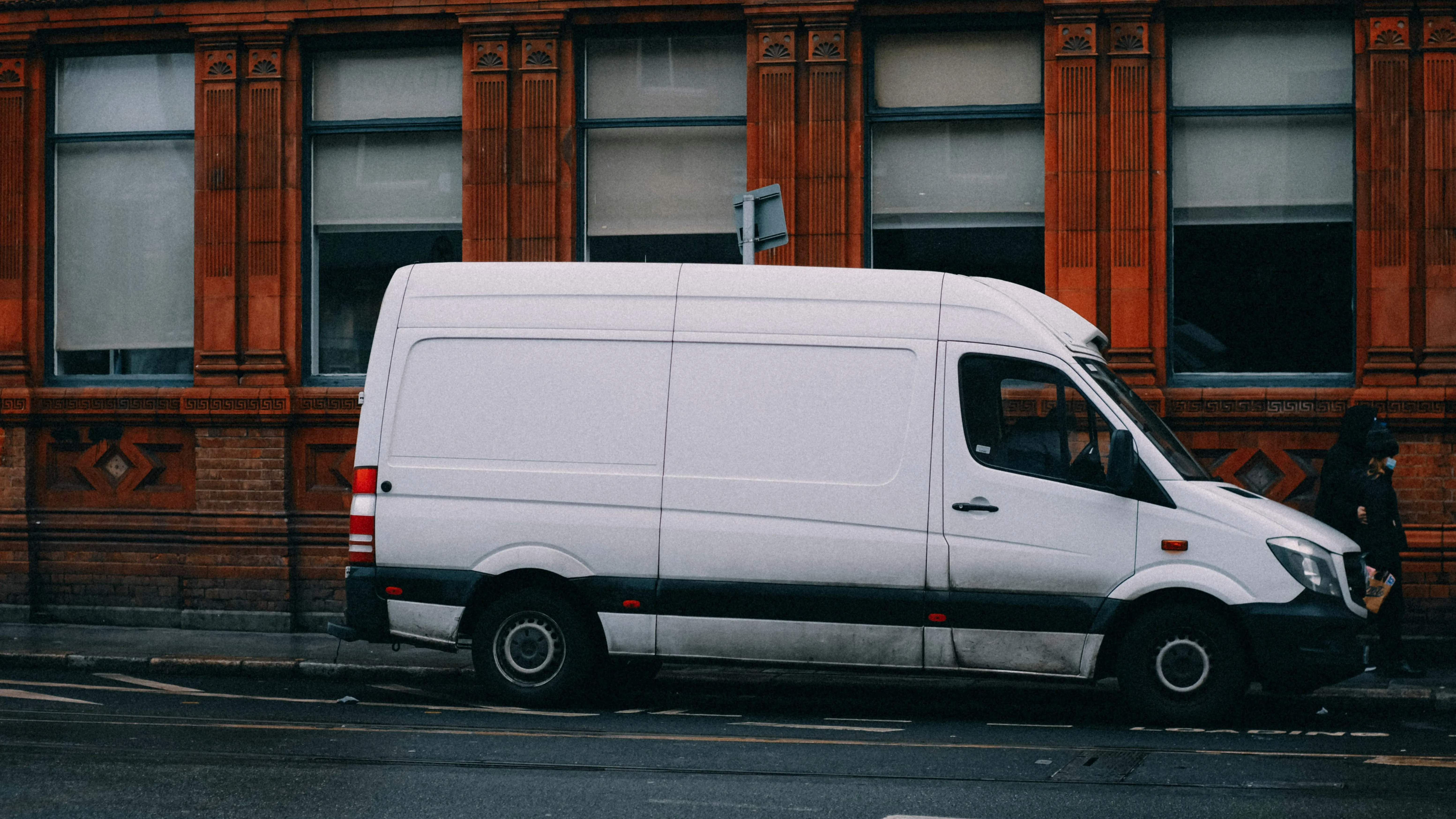 Smith Plumbing branded van parked outside a customer's home